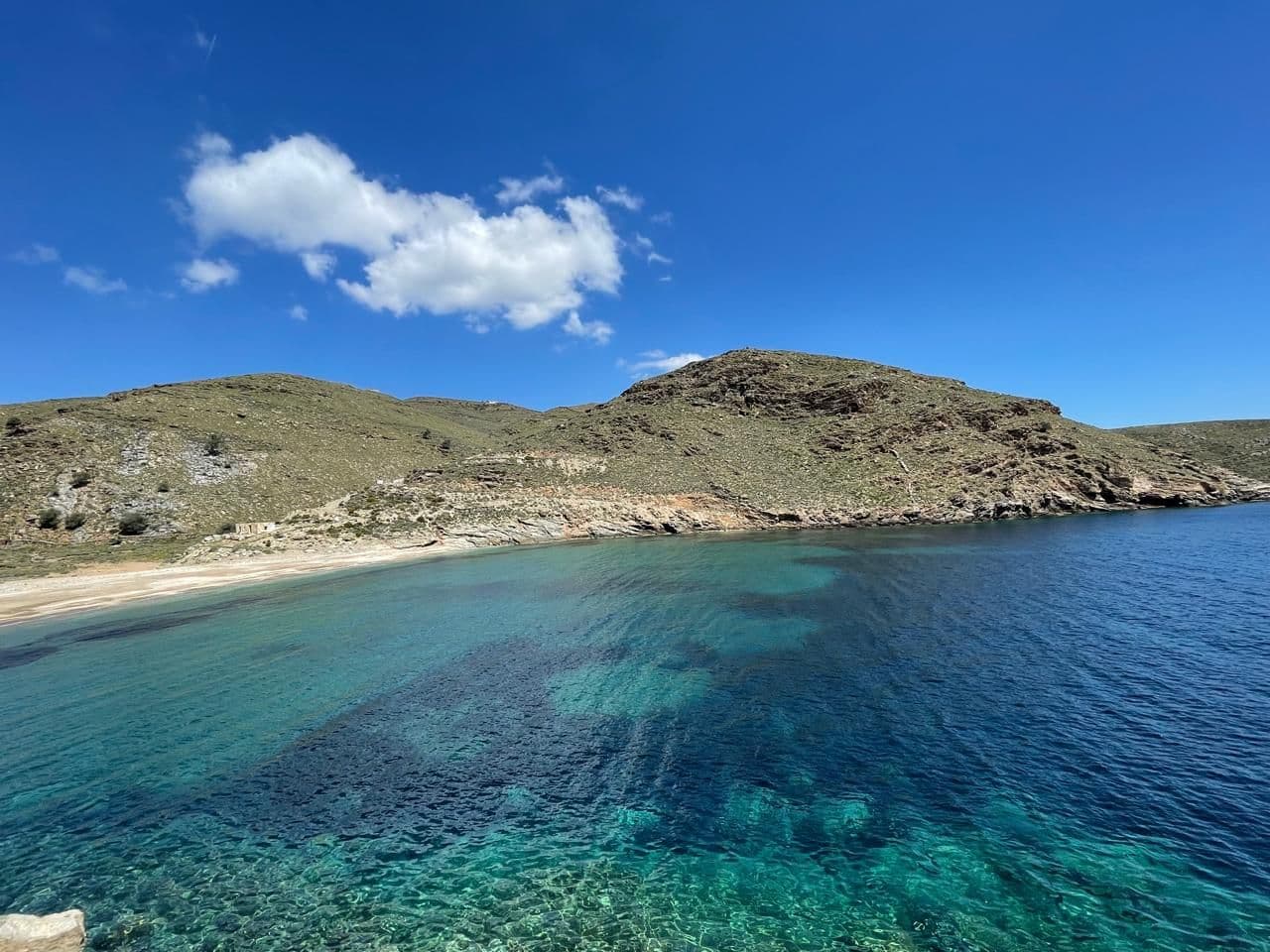 Turquoise bay and hills on the island of Kea